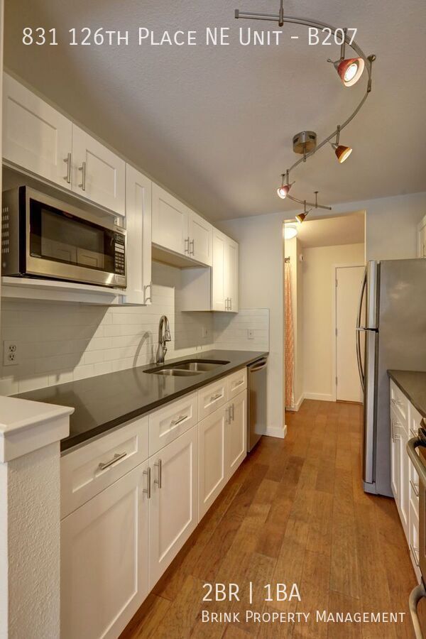Prime Bellevue Location | 2 Bed Condo + Garage + Pool property image