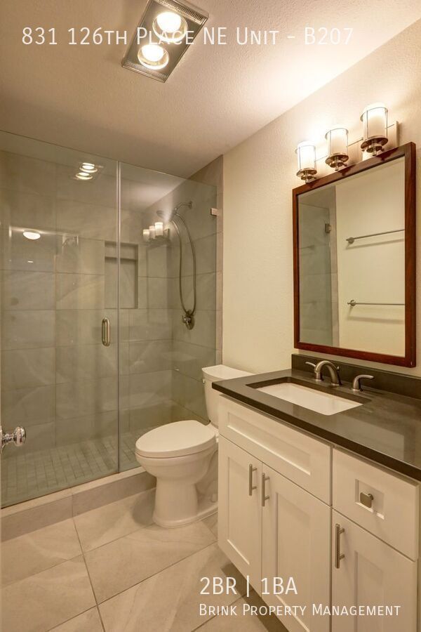 Prime Bellevue Location | 2 Bed Condo + Garage + Pool property image