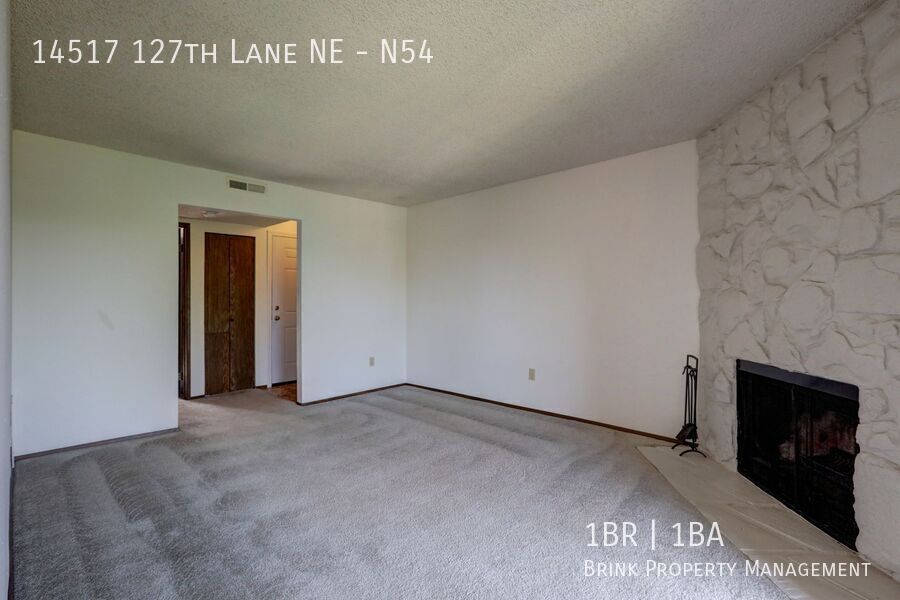 Clean Top Floor 1BR 1BA Condo with Wood Burning Fireplace property image