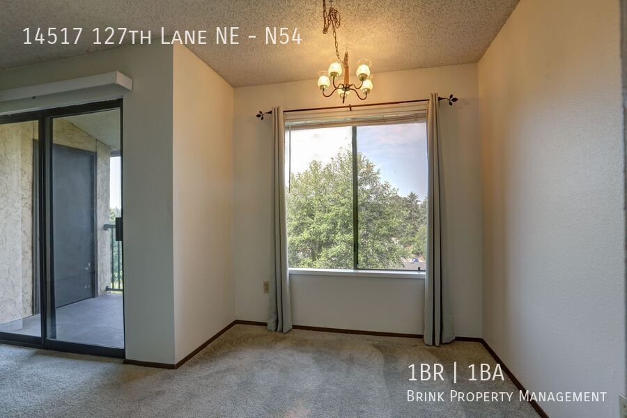 Clean Top Floor 1BR 1BA Condo with Wood Burning Fireplace property image