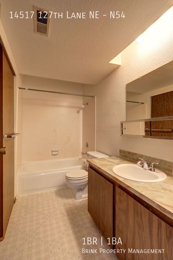 Clean Top Floor 1BR 1BA Condo with Wood Burning Fireplace property image
