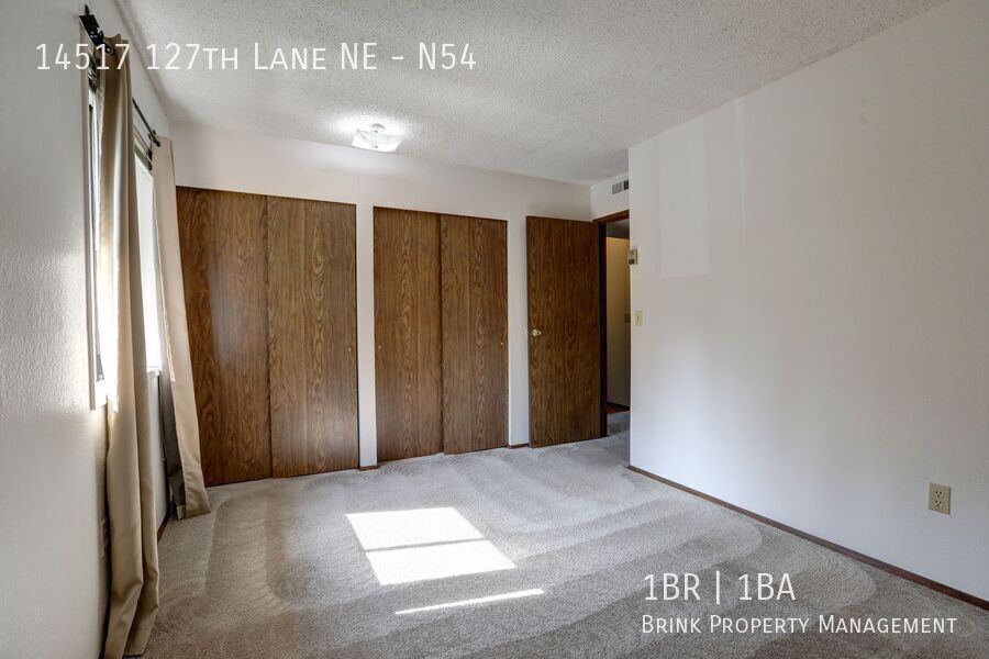 Clean Top Floor 1BR 1BA Condo with Wood Burning Fireplace property image