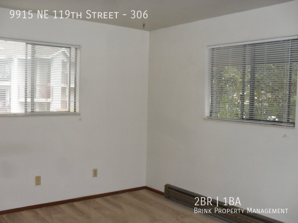 Spacious 2BR 1BA Top Floor Corner Unit Condo with Bright Western Exposure in Juanita property image