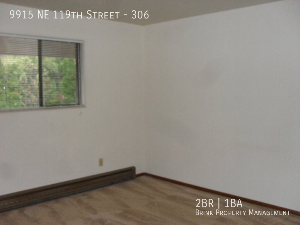 Spacious 2BR 1BA Top Floor Corner Unit Condo with Bright Western Exposure in Juanita property image